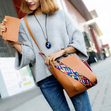 Brown Handbag and Matching Wristlet with Multi Color Guitar Strap