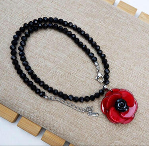 Acrylic Red Floral Pendant Necklace with Black Rhinestone Detail