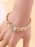 Rhinestone & Gold Bead Bracelet